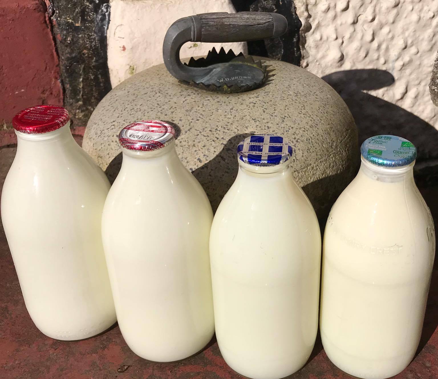 Glass bottles of fresh milk on a Largs doorstep